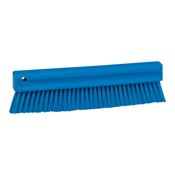 A Vikan blue brush with a long handle and bristles.