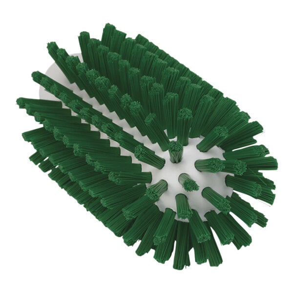 A close-up of a Vikan green stiff tube brush head with bristles.