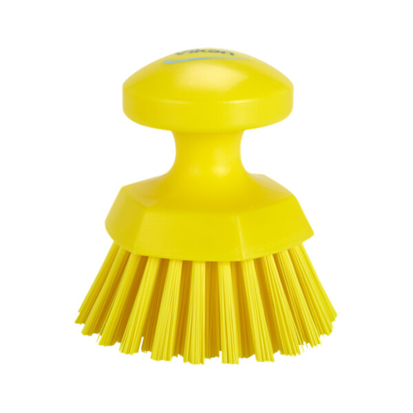 A yellow round scrub brush with a handle.