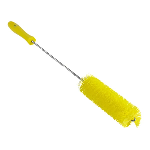 A yellow round brush with long bristles and a long handle.