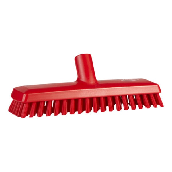 A red Vikan deck scrub brush head with bristles.