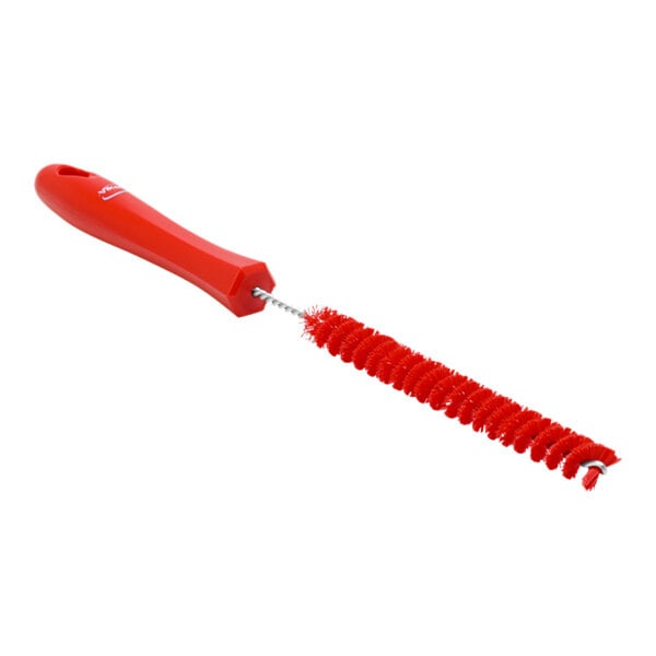 A red plastic Vikan tube brush.