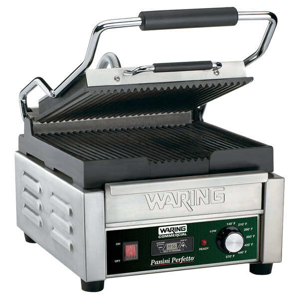 A Waring Panini Perfetto grill with a handle and a lid.