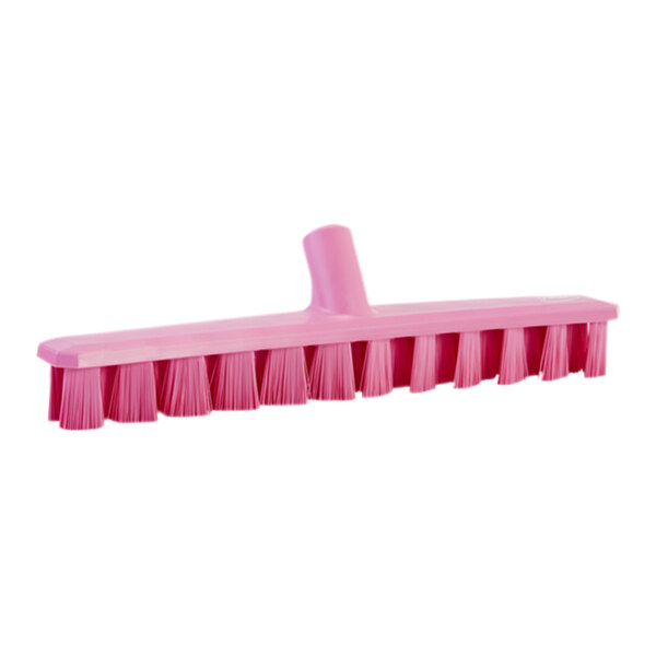 A pink Vikan deck scrub brush head with stiff bristles.