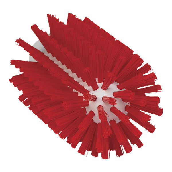 A red Vikan tube brush head with stiff bristles.