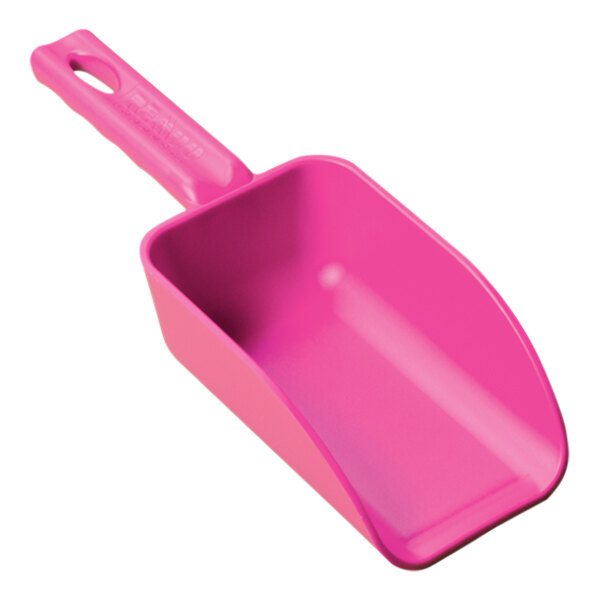 A pink plastic Remco hand scoop with a handle.