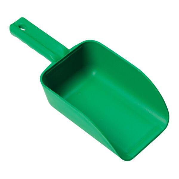A green plastic scoop with a handle