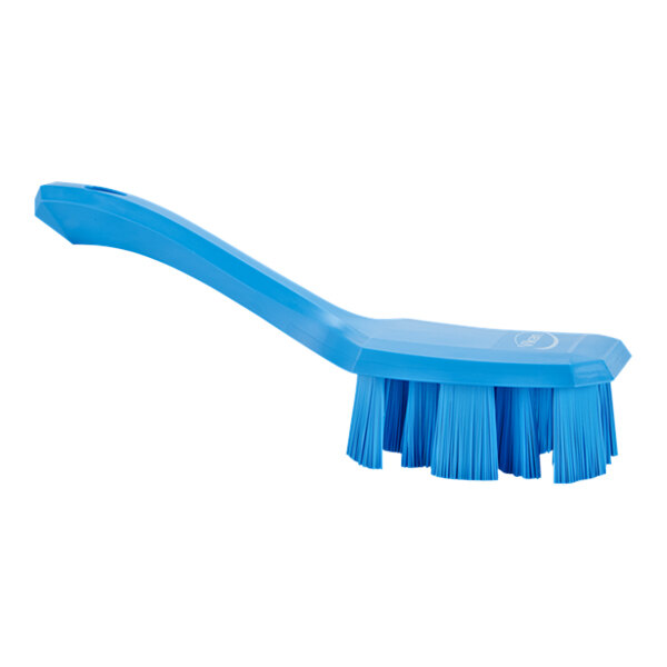 A close-up of a blue Vikan Ultra Safe Technology hand brush with a short handle.