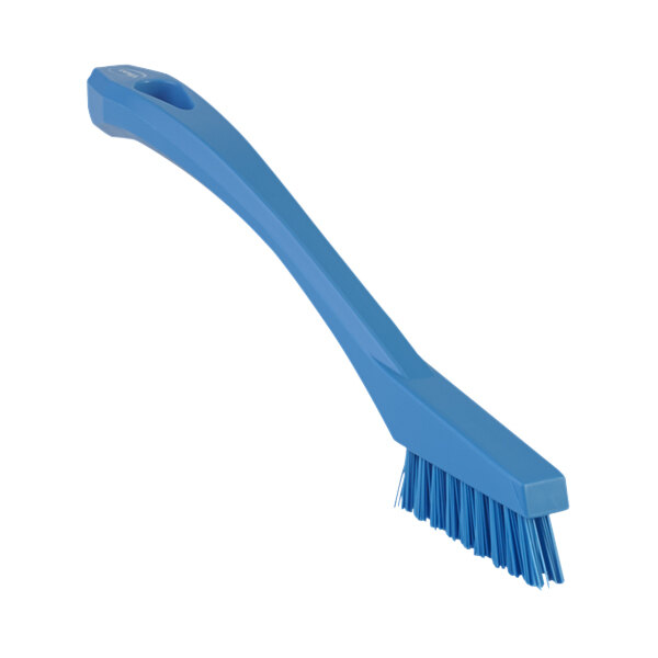 A close-up of the Vikan 8" blue detail brush with a handle.
