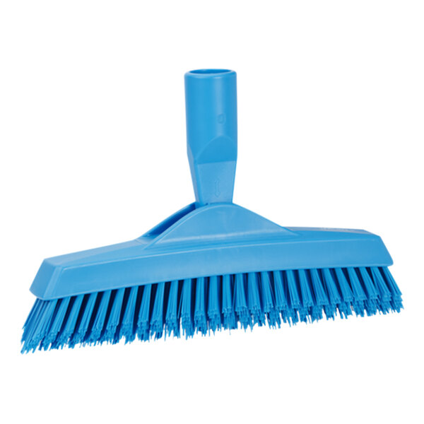 A close-up of a blue Vikan angle-adjustable grout brush with a handle.