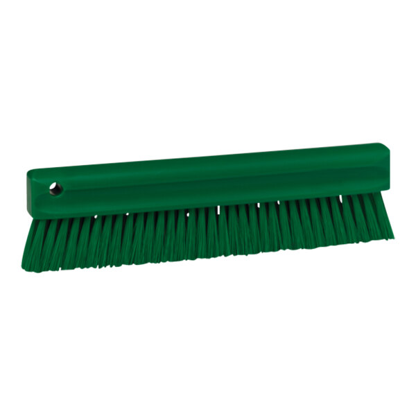 A Vikan green brush with long soft bristles and a handle.