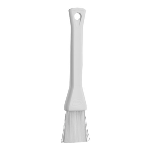 A white Vikan pastry brush with a plastic handle.