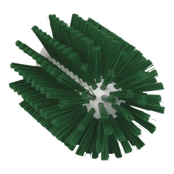 A close-up of a Vikan green medium tube brush head with many green bristles.