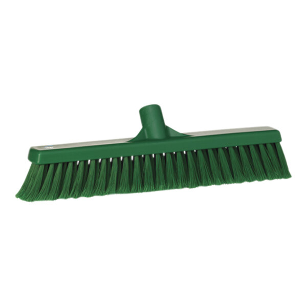 A green broom head with long, soft / split bristles.