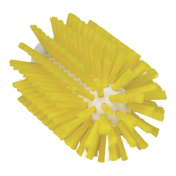A close-up of a Vikan yellow stiff tube brush head with yellow bristles.
