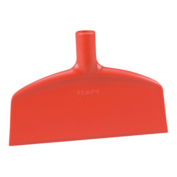 A red plastic table and floor scraper with a red handle.