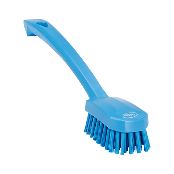 A Vikan blue utility brush with a long handle.