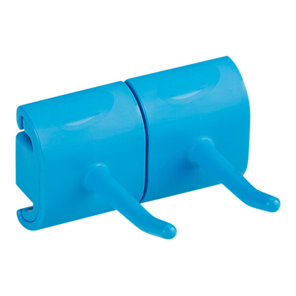 A blue plastic wall bracket with two hooks.