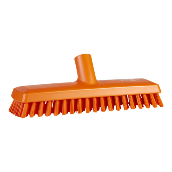 An orange Vikan deck scrub brush head with extra stiff bristles.
