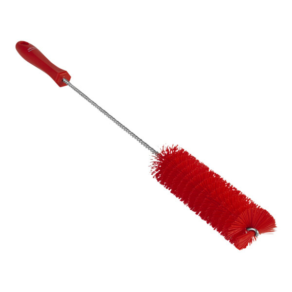 A red Vikan tube brush with a long metal handle.