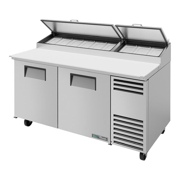 A True 67" refrigerated pizza prep table with 2 doors.