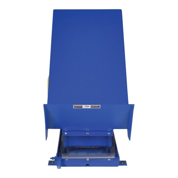 A blue rectangular metal Vestil tilt table with a white sticker.