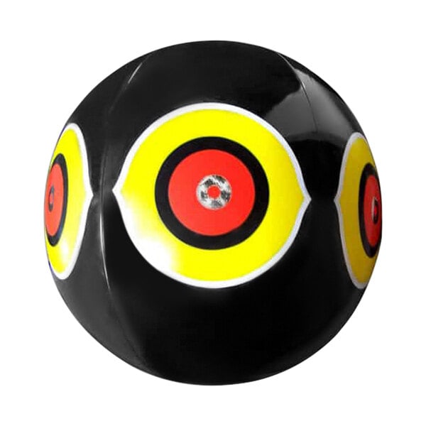 A black ball with yellow and red circles.