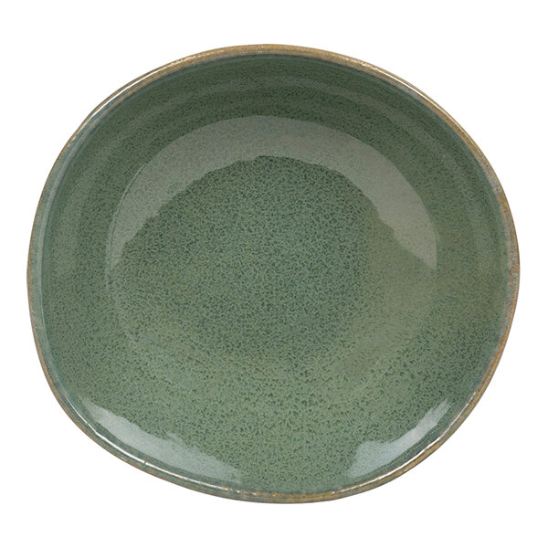 A close-up of a green bowl with a speckled rim.