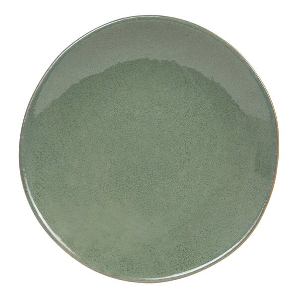 A moss green porcelain bowl with a white rim.