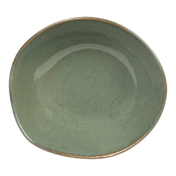 A white porcelain bowl with a moss green exterior.