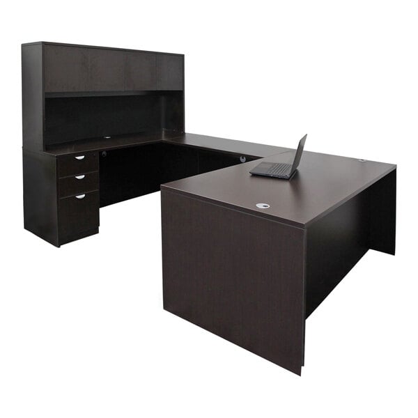 A Boss mocha laminate desk with a laptop on it and storage pedestal with two drawers and a cabinet.