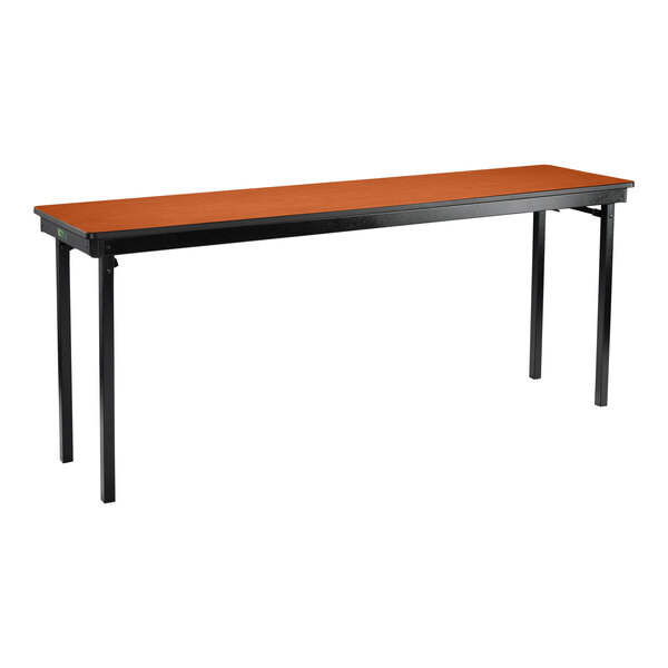 A National Public Seating rectangular folding table with T-mold edge and black legs.