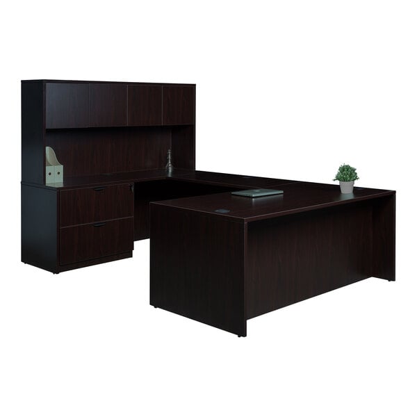 A Boss mocha laminate desk with hutch, bridge, and lateral storage with a plant on it.