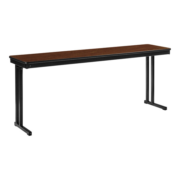 A brown rectangular National Public Seating Max training table with a black frame.
