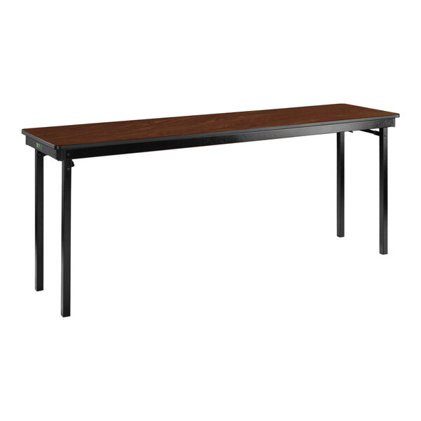A National Public Seating Montana Walnut folding table with black legs.
