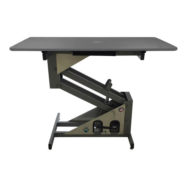 A grey rectangular grooming table with a black metal frame.