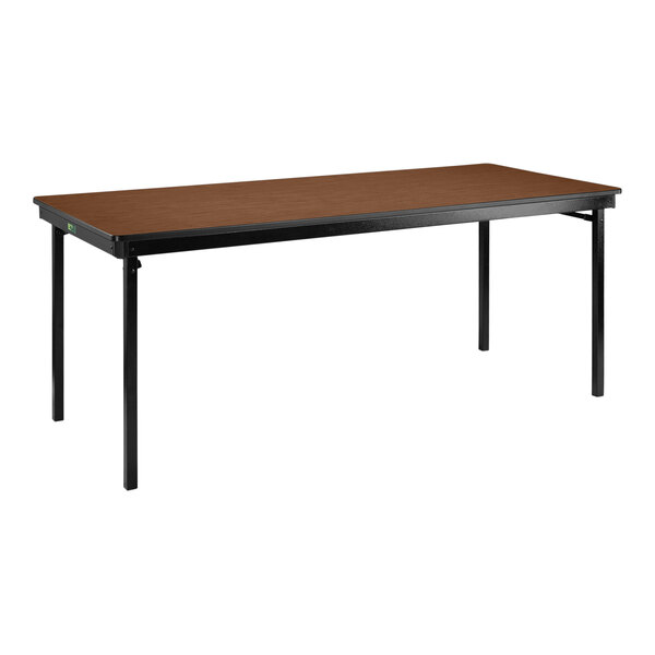 A brown rectangular National Public Seating folding table with black legs.