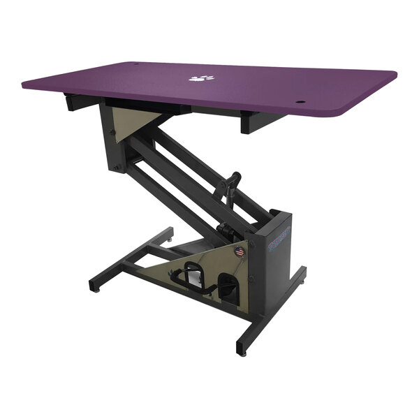 A purple Groomer's Best grooming table with a black base and a lift mechanism.