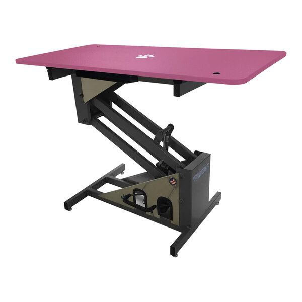 A pink Groomer's Best grooming table with a black base.