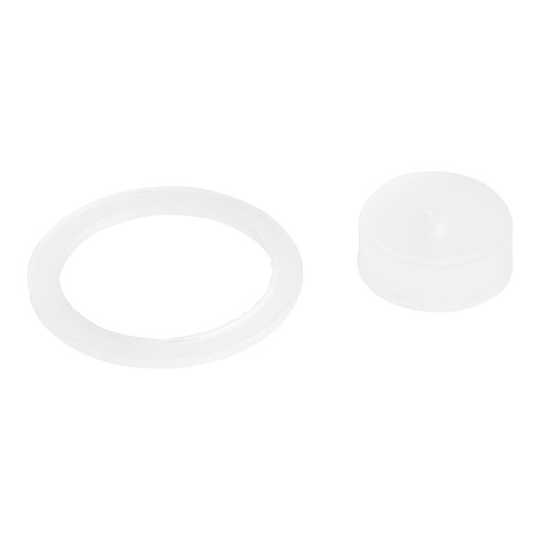 A white round object with a white plastic ring.