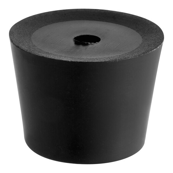 A black rubber cylinder with a hole in the bottom.