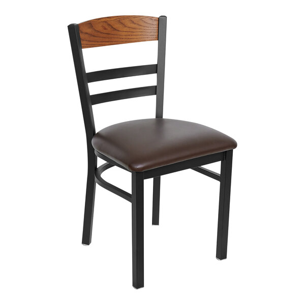 A black metal BFM Seating side chair with an autumn ash wood back panel and dark brown vinyl seat.