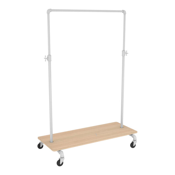 A wooden garment rack with a white metal pole and wheels.
