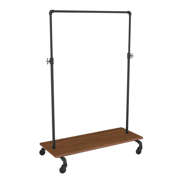 An Econoco ballet garment rack with a brown base shelf and black metal rods on wheels.