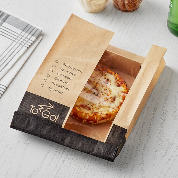 A Bagcraft EcoCraft paper bag with a window and tray holding a small cheese pizza.