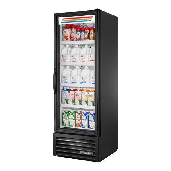 A True black refrigerated glass door merchandiser filled with milk and dairy.