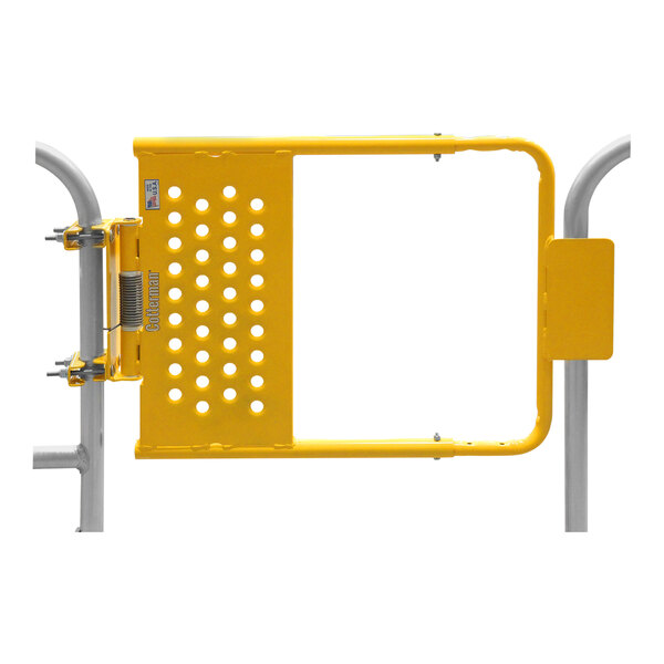 A yellow powder-coated metal Cotterman safety gate with holes.