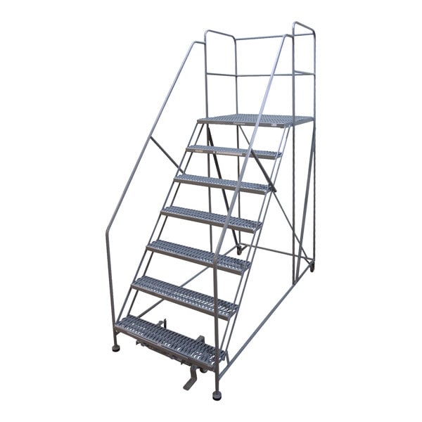 A Cotterman gray powder-coated steel rolling work platform with metal railings and steps.
