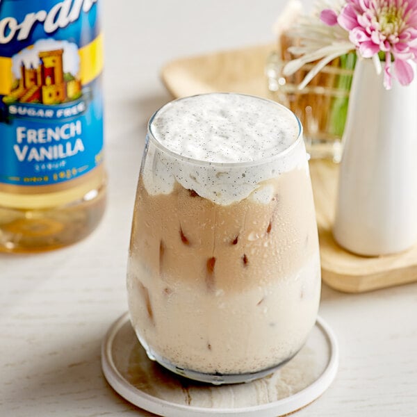 A glass of iced coffee with Torani Sugar-Free French Vanilla syrup in it.