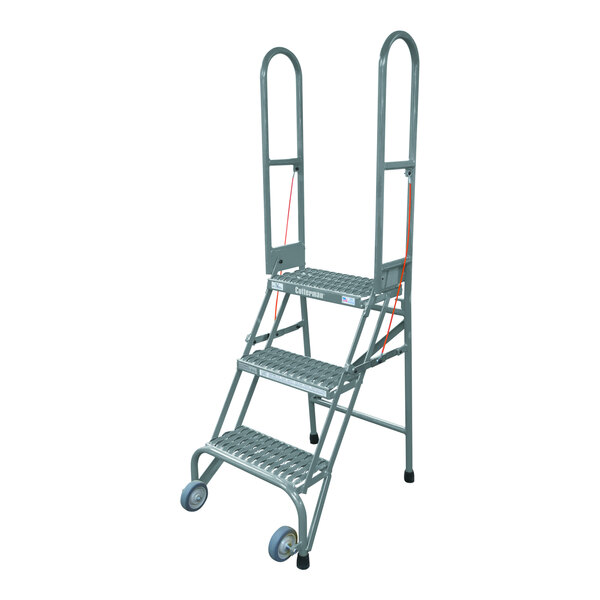A gray metal Cotterman rolling ladder with three steps.